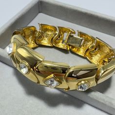 Pre-Loved, Vintage Condition. Elegant Metal Diamond Bracelet With Rhinestones, Luxury Jeweled Gold Bracelets, Luxury Metal Bracelets With Sparkling Stones, Luxury Metal Bracelet With Sparkling Stones, Luxury Gold Metal Bracelet For Wedding, Elegant Jeweled Yellow Gold Bracelet, Luxury Crystal Bracelet With Diamond Accents For Formal Occasions, Luxury Rhinestone Crystal Bracelet, Designer Rhinestone Jewelry For Formal Occasions