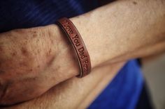 "Handmade with Genuine leather and Stainless Steel ,Great piece of men jewelry! Super comfortable & easy to wear. Great, meaningful gift idea for Father's Day ----- PERSONALIZATION: ------- Family name, special date, initials, morse code, coordinates (basically anything you want) can be engraved on the outside of the bracelet. If you want your date to be in Roman Numerals please mention that in the note to seller and provide the date in Roman numerals. ★Notice How to order MATCHING BRACELETS Leather Bracelets For Men, Leather Studio, Personalized Leather Gifts, Coordinates Bracelet, Family Bracelets, Personalised Bangle, Father Christmas Gifts, Personalized Leather Bracelet, Personalized Gifts For Dad