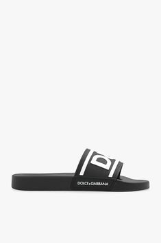 Black slides from Dolce & Gabbana. Crafted from rubber, this model showcases a tactile white logo on the front, side and back. Sole height: 2cm Sole height at the highest point: 3cm Black Slides With Logo, Black Logo Slides, Casual Open Toe Slides With Logo Print, Casual Black Slides With Logo, Casual Slip-on Sandals With Logo, White Leather Sandals, Dolce Gabbana Shoes, Black Slides, Z Logo