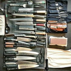 an assortment of kitchen utensils and knives in a case