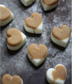 heart shaped marshmallows on a baking sheet