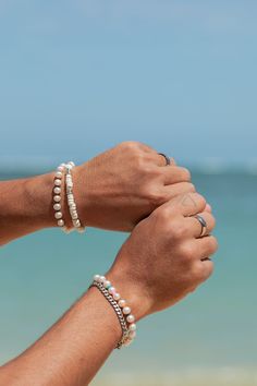 This stretchy white puka shell bracelet is sure to become a favorite. Designed to be gender inclusive, this classic surfer's bracelet is the new staple beach accessory.✦ Due to the nature of the puka shells, each bracelet is one of a kind, therefore color, shape, and size will vary. ✦✦ DETAILS ✦✧ Name: Ikaika (ee-KIE-kah) - man of strength.✧ Natural White Puka Shells.✧ Silver plated base metal spacer beads.✧ All Ke Aloha Jewelry pieces come packaged thoughtfully, beautifully, and ready for gift White Strand Bracelets For Vacation, White Strand Bracelet For Vacation, Adjustable White Stretch Bracelet With Beachy Style, White Strand Bracelets For Beach Season, White Adjustable Stretch Bracelet With Beachy Style, Stackable Casual Friendship Bracelets For Beach, White Adjustable Beachy Stretch Bracelet, Adjustable White Pearl Bracelet For Beach, White Adjustable Bracelets For Vacation