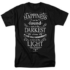 a black t - shirt that says happiness can be found in the darkest light