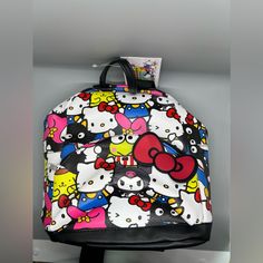 Licensed Sanrio Backpack. Vegan Leather! 10" Mini Backpack With Hello Kitty And Friend Characters! Super Spacious And Very Secure, Zippers Work Perfectly! No Flaws, Little Pocket May Fit Multiple Items! Straps Are Adjustable!! Trendy Hello Kitty Print Bag For Back To School, Trendy Hello Kitty Print Back To School Bag, Trendy Hello Kitty Back To School Bag, Hello Kitty Backpack For Everyday Use, Everyday Hello Kitty Backpack, Trendy Hello Kitty Print Backpack For Everyday Use, Trendy Hello Kitty Print Backpack, Everyday Multicolor Hello Kitty Backpack, Fun Black Standard Backpack