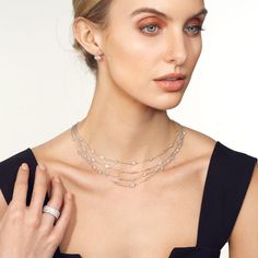 The Five Layer Multi Shape Bezel Station Necklace is an extraordinary and luxurious piece of jewelry that commands attention with its captivating design and unparalleled brilliance.This exquisite necklace features five rows adorned with an impressive array of diamonds in various shapes, meticulously set within sleek bezels. The diamond shapes include round brilliants, marquise, pear, and emerald cuts, each carefully selected for its exceptional quality and fire. The bezel settings not only secur Infinity Pendant, Station Necklace, Fancy Color Diamonds, Gold Platinum, Lab Diamonds, Custom Rings, Bezel Setting, Diamond Shapes, Diamond Rings