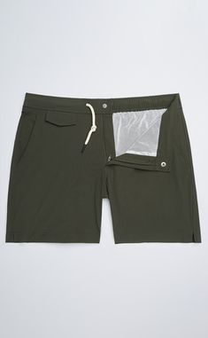 A classic piece for summer, our swim shorts provide elegant styling at the beach or by the pool. The nylon/spandex blend fabric is quick-drying and offers comfortable stretch. The elasticated waistband is designed for a comfortable, flexible fit, and the traditional waist drawstring keeps them securely fastened. Other details include a YKK zipper fly and multiple pockets for plenty of storage space. A smart look both in and out of the water, you can wear them for a swim or grabbing drinks at a poolside bar. Poolside Bar, The Pool, Swim Shorts, Dark Navy, At The Beach, Storage Spaces, The Beach, Swimming, Pool