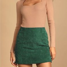 Product Details Set The Bar For Style In The Lulus High Class Emerald Green Corduroy Mini Skirt! Lightweight Ribbed Corduroy Fabric Shapes This Sweet Little A-Line Style Mini Skirt, Complete With A High Fitted Waist And A Slightly Flared Hem. The Flirty Length Is Perfect For Pairing With Your Favorite Over-The-Knee Boots! Hidden Back Zipper. Fully Lined. Shell: 100% Polyester. Lining: 97% Polyester, 3% Spandex. Hand Wash Cold. Do Not Bleach. Line Dry. Iron Low Heat. Chic Green Mini Skirt For Winter, Casual Corduroy Mini Skirt For Winter, Trendy Corduroy Mini Skirt For Winter, Trendy Winter Corduroy Mini Skirt, Green Casual Mini Skirt For Winter, Fitted Mini-length Corduroy Skirt, Fitted Corduroy Mini Skirt, Trendy Green Mini Skirt For Winter, High Waist Fitted Corduroy Mini Skirt