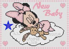 a cross stitch pattern with an angel holding a teddy bear on it's back