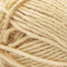 a ball of yarn is shown in white