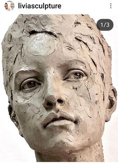 a close up of a statue of a person's head