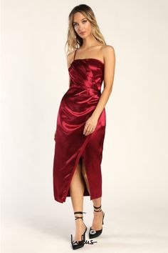 You'll be looking red carpet-ready wherever you go when you've got the Lulus Glamorous Entrance Wine Red Satin One Shoulder Midi Dress! Sleek woven satin shapes this undeniably elegant dress that has a darted bodice (with hidden no-slip strips) topped by a straight neckline and supported by a single adjustable spaghetti strap. Gathered and ruched details continue from the bodice, through the fitted waist, and into a figure-skimming skirt with an overlapping silhouette and a midi hem. Hidden zipp Midi Dress Satin, Midi Bridesmaid Dress, Stripped Tops, One Shoulder Midi Dress, Red Midi, Red Carpet Ready, Straight Neckline, Dress Satin, Satin Midi Dress