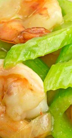 some shrimp and lettuce are on a plate