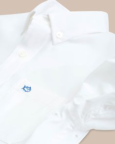 Young boys won’t mind dressing up in this ultra-comfort button down shirt. With moisture-wicking fabric, UV sun protection and lightweight 4-way stretch, this classic white button down is perfect for school, church, and any day in between. Preppy Boys Outfits, Preppy Boys, Classic White Shirt, Dressing Up, White Button Down, Southern Style, White Shirts, New Man, Moisture Wicking Fabric