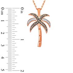 Dazzling with the coolness of diamonds, this diamond palm tree pendant is a charming reminder of the lazy days of summer. Crafted in precious 10K rose gold, this sparkling design features fronds of shimmering white and alluring champagne diamonds atop a gently curved palm tree trunk. Radiant with 1/8 ct. t.w. of diamonds and a bright polished shine, this pendant suspends along an 18.0-inch rope chain secures with a spring-ring clasp. Palm Tree Trunk, Palm Tree Pendant, Tree Pendant, Lazy Days, Champagne Diamond, Rope Chain, Spring Rings, White Diamond, Palm Tree