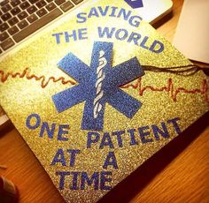 a graduation cap with the words saving the world one patient at a time on it