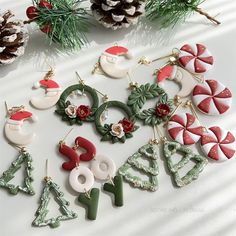 some christmas ornaments are laying out on a table