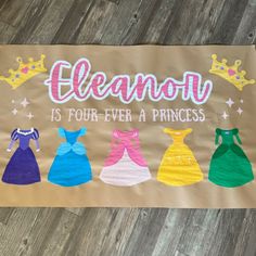 a banner with princess dresses on it