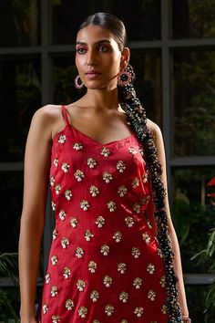 Red sleeveless kurti with all over Damask fiore motif embroidery using pearls, sequin and beads highlights. Paired with a shell shaped sequin embellished sheer skirt. - Aza Fashions Navratri Festive Hand Embellished Dresses, Hand Embellished Dresses For Navratri Festival, Hand Embellished Festive Dress For Navratri, Traditional Embellished Sleeveless Tops, Elegant Sleeveless Dress For Diwali, Sleeveless Party Dress For Diwali, Summer Tops With Dori Work, Sleeveless Party Wear Sets For Festivals, Bollywood Style Hand Embellished Dresses