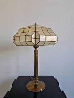 a lamp that is sitting on top of a table