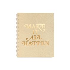 a spiral notebook with the words make it all happen written in gold foil on top