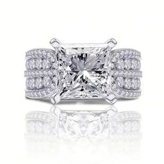 a princess cut diamond engagement ring with pave set shoulders