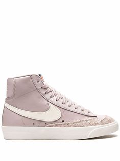 Light purple suede/leather Blazer Mid '77 LX sneakers from NIKE featuring signature Swoosh logo detail, logo print to the rear, suede panels, round toe, front lace-up fastening, logo patch at the tongue, branded insole and flat rubber sole. These styles are supplied by a premium sneaker marketplace. Stocking only the most sought-after footwear, they source and curate some of the most hard to find sneakers from around the world.. Nike Blazer Mid 77, Nike Blazer Mid, Nike Blazers Mid, Nike T, Purple Suede, Blazer Mid, Swoosh Logo, Nike Blazer, Leather Blazer