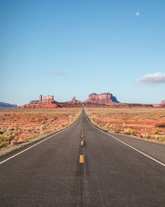 an empty road in the middle of nowhere