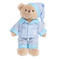 a teddy bear wearing pajamas and a hat