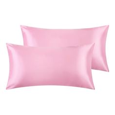 two pink pillows on white background