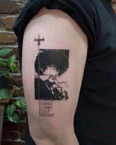 a person with a tattoo on their arm that has an image of him and his cross