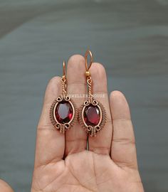 Hello and Welcome To RSJEWELLERYHOUSE , where we present our best designed products. We, self are the designers, makers and sellers. We have aimed to Supply Good Quality Products at best prices around. Garnet Earring Wire Wrapped Jewelry Handmade Copper Earring Gemstone Jewelry Drop and Dangle Earring Wonderful Gift For Her Garnet Jewelry Handmade Copper Earring Metal- Copper Gemstone- Garnet Color-Red Benefits Of Wearing Garnet  - It protects the wearer from negativity and evil thoughts. It induces passion, fire, energy, stability, and is believed to bring good luck in love and relationships. Garnet is a stone meant to bring success in life and helps to achieve the goals set in life by its possessor. Benefits Of Wearing Copper Jewelry- Copper is believed to have anti-inflammatory properti Handmade Brass Crystal Earrings As Gift, Handmade Brass Crystal Earrings For Gift, Copper Dangle Crystal Earrings For Gift, Copper Crystal Drop Earrings For Gifts, Copper Crystal Earrings With Ear Wire For Gifts, Wire Wrapped Brass Crystal Earrings Gift, Red Wire Wrapped Dangle Earrings, Handmade Copper Drop Crystal Earrings, Handmade Copper Crystal Drop Earrings