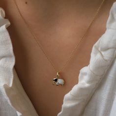 14K Real Gold Necklace Dark Blue White Enamel Elephant Pendant Handmade Minimalist Animal Design Dainty Christmas Elegance Gift for Women ⓂMaterials & Specifications : Necklace Chain Lengths : 42 cm (16.5 in) 44 cm (17.3 in) 46 cm (18.1 in) 48 cm (18.8 in) Elephant Pendant Width : 1.1 cm (0.43 in) Elephant Pendant Length : 0.9 cm (0.35 in) Handmade Item Special Design Elegant Yellow Gold Enamel Charm Necklaces, White Pendant Charm Necklace For Formal Occasions, Formal White Pendant Charm Necklace, Fine Jewelry White Charm Necklaces For Gifts, Fine Jewelry White Charm Necklace For Gift, White Enamel Necklaces For Gifts, Elegant Handmade White Charm Necklace, Elegant White Handmade Charm Necklace, Elephant Necklace Gold