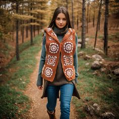 "🌸 Hi! The caramel tunic that will warm you in the coolness of summer evenings came together with daisy motifs. Dazzling Colorful colors will draw all the attention on you. This long crochet coat has an oversized and open front pattern.  🌸 This handmade Crochet Afghan Cardigan Granny Square is a beautiful and unique piece that any woman would love to have in her wardrobe. It's made of high-quality cotton blend, Alize Cotton® yarn and can be customized to your preferred color. 🌸 25\"-28\" 🌸 The cardigan is designed features an oversized and open front pattern that gives it a cozy and comfortable feel. Please note that since this product is made using afghan knitting, each piece is unique and may have a different motif sequence from what is shown in the photos. 🌸 To ensure you get the p Hippie Crochet Cardigan For Fall, Fall Hippie Crochet Cardigan, Fall Crochet Hippie Cardigan, Hand Knitted Bohemian Outerwear For Fall, Fall Festival Crochet Cardigan, Casual Fair Isle Vest For Fall, Bohemian Crochet Cardigan For Fall, Bohemian Knitted Winter Outerwear, Fall Festival Granny Square Cardigan