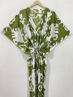 "This Beautiful Indian Cotton Caftan or can be called as Tunic is made with super fine quality cotton and designs have been crafted by Hand Prints. Measurements :- Size - Free Size Length -138 Cm / 54 Inches Bust/chest size - 87 CM/ 34 Inches Fabric - 100% Cotton Pattern - Floral Kaftan has Adjustable Drawstring Waist to loose or tight , Kaftan has V Shape Neck Which is 8\" Inches Deep. Kaftan Is Multi-purposeand can be worn as a cover up at the Beach ,Lounge wear ,sleepwear ,Pregnant Women Hospital Gown for Newly Moms ,Maxi Dress ,Free Dress etc . Indian Kaftan Very comfortable to wear in both hot or cold weather. Kaftan Is super Comfortable .it will be loose and free Flowing and Fabric is very soft with Vibrant Color Note :-Due to different Monitor Setting Colors may be Little vary To or Printed Cotton V-neck Kimono, Green Batik Print Kaftan For Beach, Traditional Green Batik Print Kaftan, Traditional Green Kaftan With Batik Print, Green Batik Print Kaftan For Summer, Green Summer Kaftan With Batik Print, Summer Green Batik Print Kaftan, Green Cotton Dress With Kimono Sleeves, Green Printed Cotton Kimono