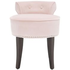 an upholstered pink chair with studded legs