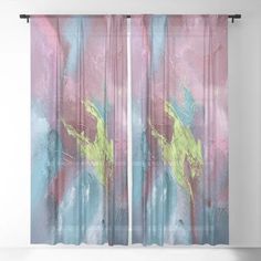 an abstract painting with pink, blue and yellow colors on the curtain panels in front of a white wall