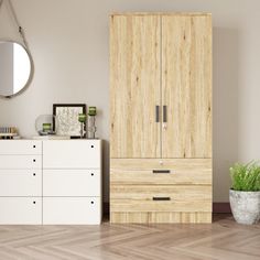 a white dresser sitting next to a wooden cabinet in a room with wood flooring