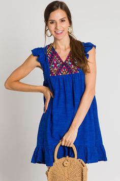 Blue V-neck Dress With Embroidered Hem, Blue Cotton Dress With Floral Embroidery, Blue Cotton Dress With Embroidered Hem, Blue Cotton Dress With Ruffle Hem, Blue Cotton Embroidered Beach Dress, Blue Dresses With Embroidered Hem, Blue Cotton Embroidered Dress For Beach, Casual Blue Dress With Embroidered Hem, Casual Cotton Dress With Embroidered Neckline