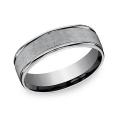 a wedding band that is made from white gold with a satin finish and beveled in