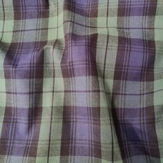 the fabric is purple and white checkered