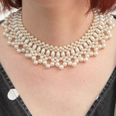 ❤Feel every inch a classic Hollywood star in this elegant 1950s vintage pearl necklace. A mid weight choker (or collar) style necklace that sits at the base of the neck. Gorgeous scalloped design with faux pearls woven in an assortment of sizes and styles (from round to oval) . Secures with pretty gold tone box tab insert clasp etched with a delicate floral design.  ❤Would be the ultimate accessory for a vintage or Mid-Century style bride, or a very special occasion.  ❤Condition: This gorgeous necklace is in good vintage condition. All pearls are secure with barely any marks or peeling (except for a tiny peel on a pearl near the tab insert which is barely noticeable) . There is one small repair next to the box section of the box tab clasp (one pearl is missing and a couple of the hoops on Vintage Pearl Necklace, Scalloped Design, Beads Art, Pearl Necklace Vintage, Necklace Collar, Beaded Necklace Diy, Pearl Choker Necklace, Vintage Pearl, Box Clasp