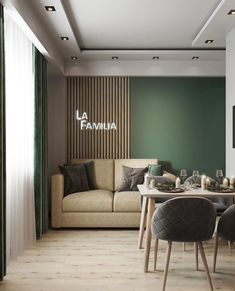 a living room filled with furniture next to a dining table and chairs in front of a green wall