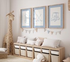 a baby's room decorated in blue and white