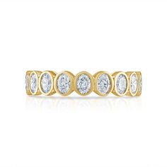 The Bezel Set Oval Eternity Band features 18 beautiful oval cut stones and is the perfect piece to wear on its own or to add to your stack. Available in 18K White, Yellow, and Rose Gold Diamond weight = 1.38 carats This item is FINAL SALE Classic Oval Eternity Band, Oval Diamond Cut Eternity Band, Elegant Oval Halo Eternity Band, Luxury Oval Eternity Band For Anniversary, Elegant Gold Oval Eternity Band, Elegant Oval Gold Eternity Band, Oval Yellow Gold Eternity Band For Anniversary, Oval Yellow Gold Eternity Band Fine Jewelry, Oval Yellow Gold Eternity Band