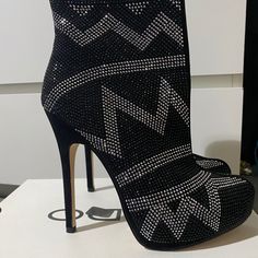 Brand New Never Worn, Old But Never Worn. Size 8.5 But I’m A 9 So They Don’t Fit Me. I Love These . Comes With Box And Heel Tips. Elegant Black Boots With Bling, Chic Silver Heels For Winter, Silver Platform Boots For Night Out, Chic Black Heels With Bling, Elegant Black Sparkling Boots, Black Evening Boots With Bling, Black Rhinestone Ankle-high Heels, Silver Heels For Night Out In Winter, Chic Boots With Silver Studs For Night Out