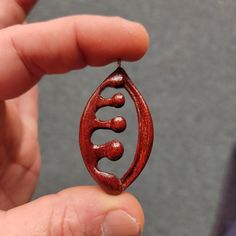 "This unique pendant is hand carved out of beautiful mahogany wood.This handmade wooden necklace is one of a kind and is a perfect daily accessory and suitable for special occasions. This wooden pendant is a special gift for him and her.It comes with Korean waxed cord and has lobster clasp at the end. You can chose between several options on how long you want the necklace to be -18\", 20\", 24\", and 30\"  inches . For custom necklace lengths send me a message. If you have any questions about th Unique Mahogany Jewelry For Gift, Unique Handmade Natural Wood Jewelry, Handmade Artisan Mahogany Jewelry, Handmade Wooden Pendant Jewelry, Artisan Handmade Mahogany Jewelry, Unique Natural Wood Pendant Jewelry, Nature-inspired Wooden Pendant Jewelry, Unique Natural Wood Jewelry, Carved Natural Wood Nature-inspired Jewelry