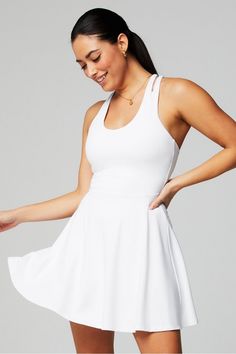 Boost Performance Dress Fabletics white/white female Activewear >> Womens >> One-Pieces regular Tennis Built-in Bra/Hidden Pockets/Removable Bra Cups Stretch Tennis Dress With Built-in Bra For Spring, Moisture-wicking Sports Dresses For Spring, White Tennis Dress For Summer Sports, Stretch Tennis Dress For Gym And Spring, Spring Stretch Tennis Dress For Sports, White Summer Tennis Dress For Workout, White Fitted Activewear With Built-in Bra, 4-way Stretch Tennis Dress For Spring Workout, White Sleeveless 4-way Stretch Activewear