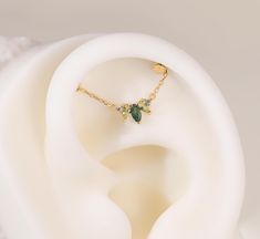 ★Product Description★ Metal: 14K solid gold,  Available Gold color: Yellow gold Guaranteed Authentic 14K Solid Gold, Not Plated or Gold Filled Stone: Moss Agate / Moissanite/Peridot  Chain Length: 25 (wearable length excluding two jump rings) * Jump rings fit 16g/18g/20g clicker (jumping ring inner size is 2.0mm)   ★Sold as Single Item   ★ DESIGN INSPIRATION Inspired by flexibility, these 14-carat gold pendant earrings allow you to customise your unique style. Each meticulous gold chain is inlai Helix Chain, Wrap Earrings, Double Chain, Ear Cuffs, Ring Fit, Cuff Earrings, Tragus, Moss Agate, Pendant Earrings