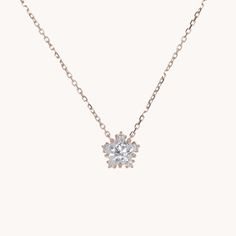 Straight from the Tokyo workshop of master jeweler Yoshinobu Kataoka, the Snowflake Necklace is as well-formed as a cherry blossom in peak bloom, and as glimmering as a snowflake. A refined, graceful, romantic necklace to get lost in. See Details for item specifics (carat weight, metal, etc).Financing options available in partnership with Affirm. White Gold Snowflake Necklace For Anniversary, Elegant Snowflake Shaped Cubic Zirconia Jewelry, Silver Snowflake Necklace Elegant Style, Diamond White Snowflake Jewelry For Formal Occasions, Elegant Silver Snowflake Necklace, Elegant Snowflake Necklace For Anniversary, Timeless Flower Pendant Necklace As Gift, Timeless Flower Pendant Necklace Gift, Timeless Flower Pendant Necklace For Gifts