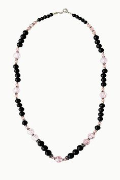 Amour Black Onyx and Pink Crystals Necklace is a gorgeous accessory that infuses your life with inspiring love and passion. Black Onyx offers powerful protection by absorbing and transforming negative energy, while Pink Crystals attract love, healing, and passion. Oxidized sterling silver beads and spacers add an elegant touch to this beautiful balancing and healing necklace. Black Onyx: Endurance, Perseverance, Grounding Pink Crystals: Love, Healing, Passion Hallmarked Metal: 925 Sterling Silve Black Gemstone Beaded Necklace With Spiritual Style, Adjustable Black Crystal Gemstone Necklace, Spiritual Black Beaded Gemstone Necklaces, Black Spiritual Jewelry With Natural Stones, Spiritual Black Gemstone Beaded Necklace, Spiritual Black Beaded Gemstone Necklace, Black Crystal Necklace With Natural Stones, Elegant Onyx Beaded Necklace For Healing, Black Necklace With Healing Gemstone Beads